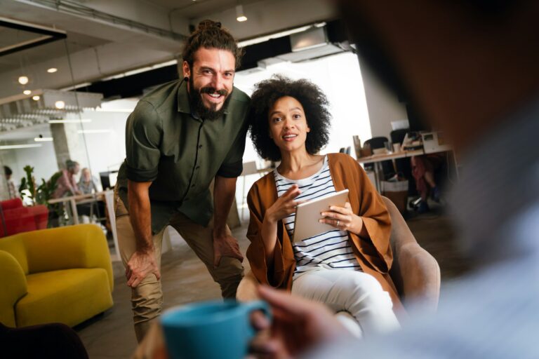 Portrait of creative business people team working together and smiling in office